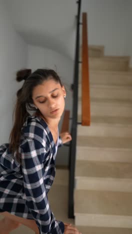 young woman on stairs