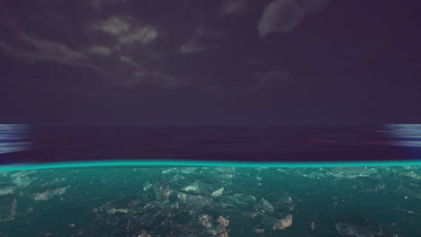 vista dividida sobre y bajo el agua en el mar del caribe con nubes