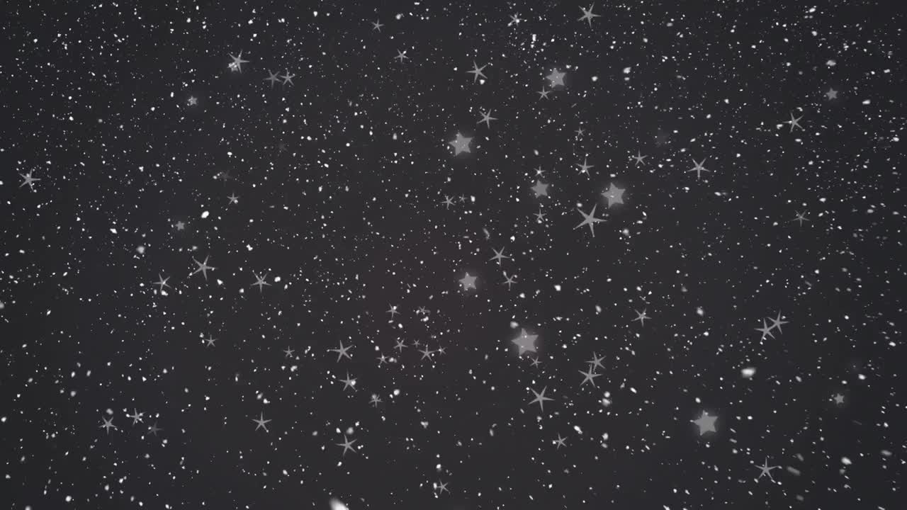 Animation of snow falling over black background at christmas