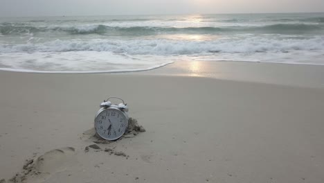 beach sunrise/sunset with alarm clock