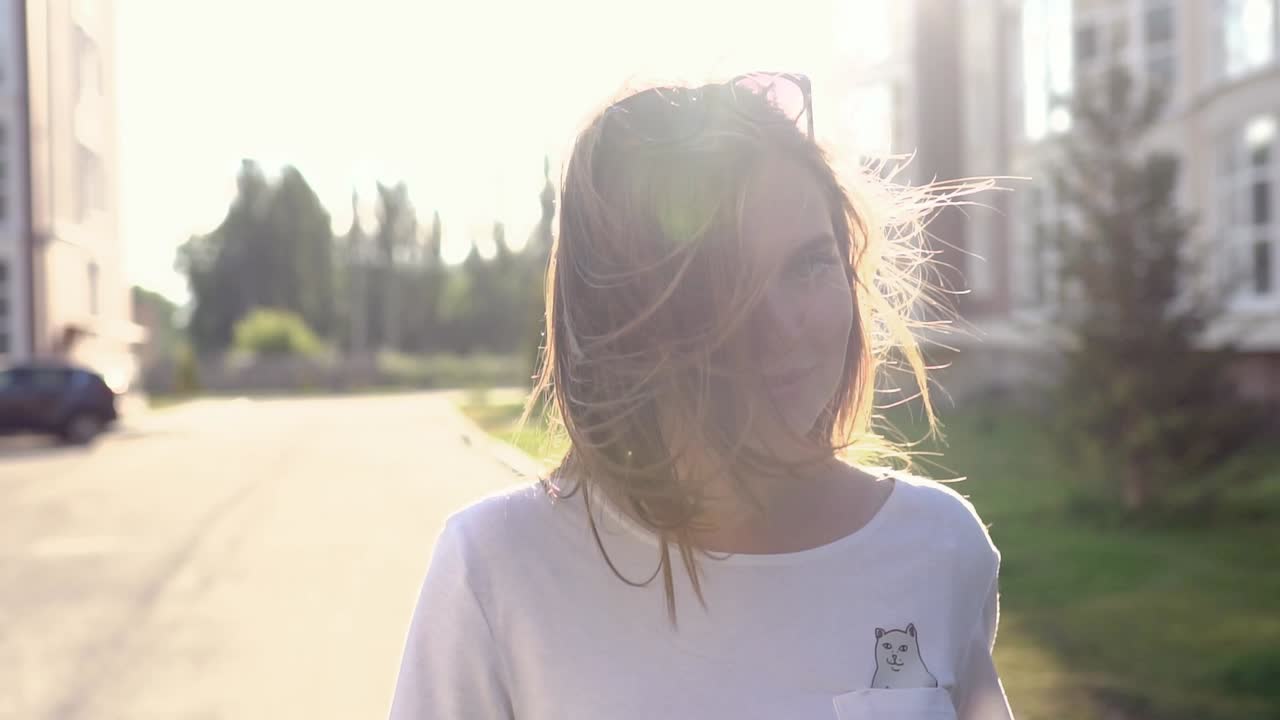 Young woman outdoors on a sunny day