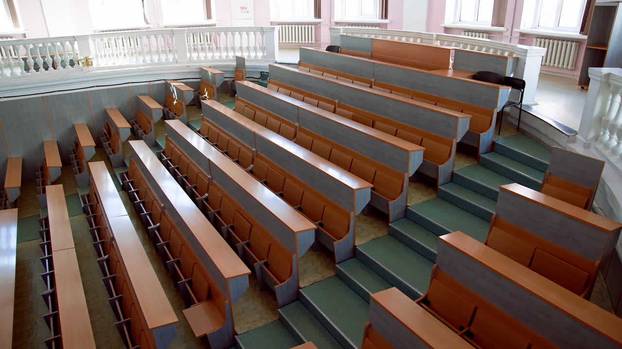 Class lecture room interior view. Empty university classroom after the cancellation regarding covid 19