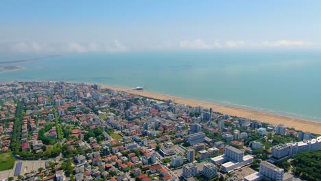 aerial: cityscape with beautiful blue water ocean