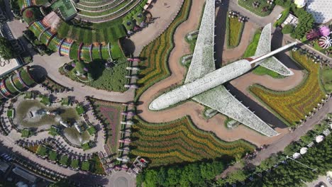 Drone-view-of-Miracle-Garden,-the-largest-natural-flower-garden-in-the-world-with-over-150-million-flowers-of-more-than-120-varieties