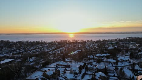 golden hour by the great lakes during winter time and sunset