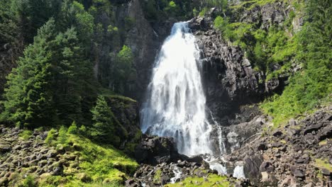 espelandsfossen waterfall cascade in granvin, odda, norway, scandinavia - tilt up