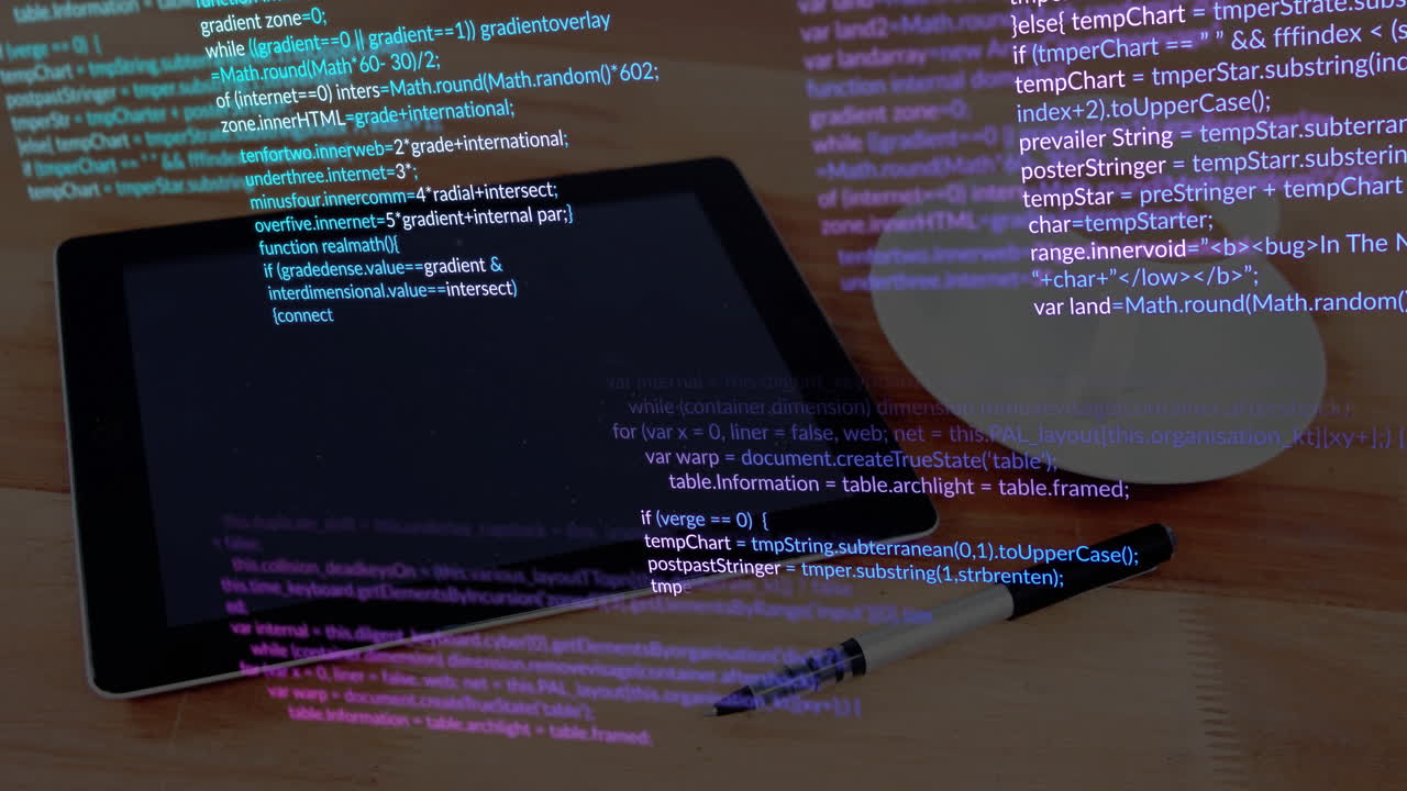 Tablet with programming code and pen on wooden desk, animation showing