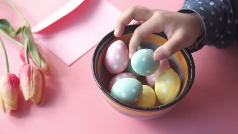 child picking easter eggs