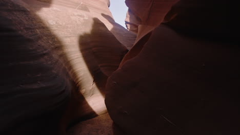 Dramatic-light-and-shadow-gimbal-shot-inside-slot-canyon