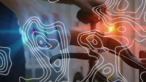 Animation of white lines over caucasian man walking with bicycle