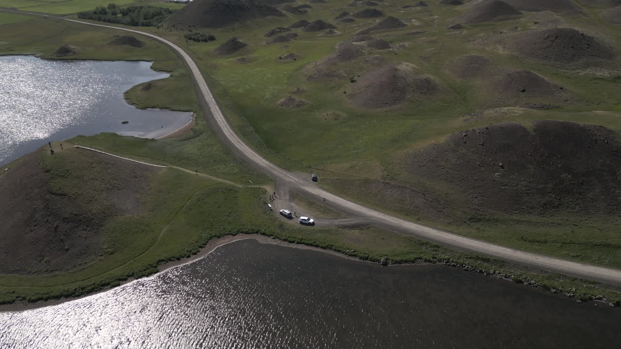 Scenic aerial of Iceland's Vatnsdalshólar hills and winding road