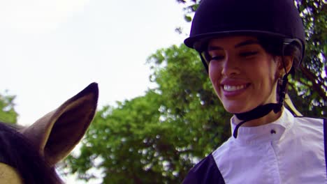 smiling-young-woman,-petting-horse,-taking-care,-nursing,-stallion,-Equestrian-sport,-equine,-friendship,-female,-horses,-smiling,-pretty,-laugh,-cap,-dressage,-stroking-manes,-enjoying-nature