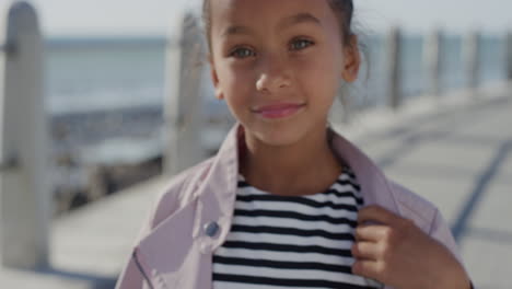 portrait-young-cute-mixed-race-girl-smiling-enjoying-summer-vacation-on-seaside-background