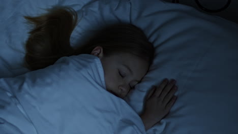 girl sleeping in bed