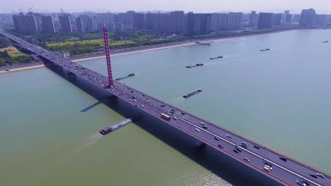 overlooking the traffic on qianjiang bridge，buildings and urban roads，qiantang river bridge in hangzhou, china，urban overpass，qiantang river, hangzhou, zhejiang