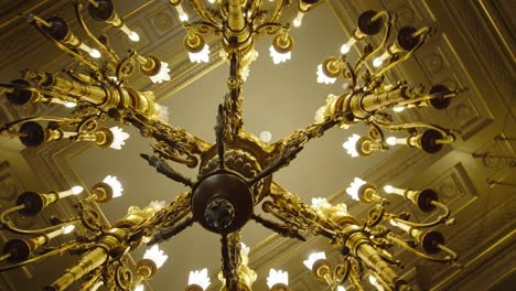 old lit chandelier in the palace