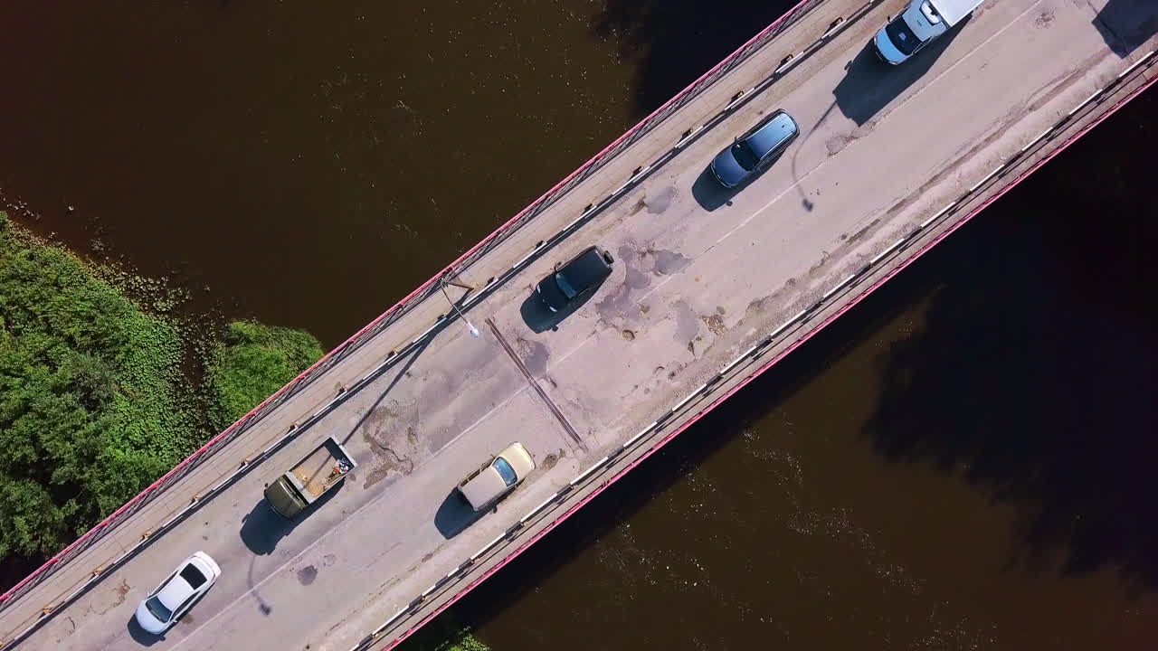 Cars on a Bridge Over a River