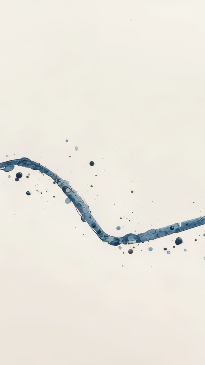 Vertical video: Entering left, blue liquid ribbon shifting right on pale paper, shedding droplets