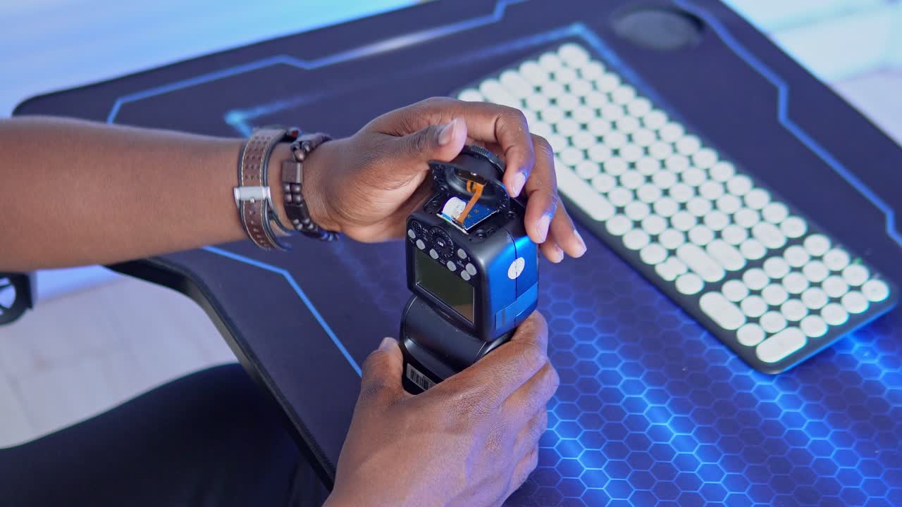 Opening up the camera flash  to repair it