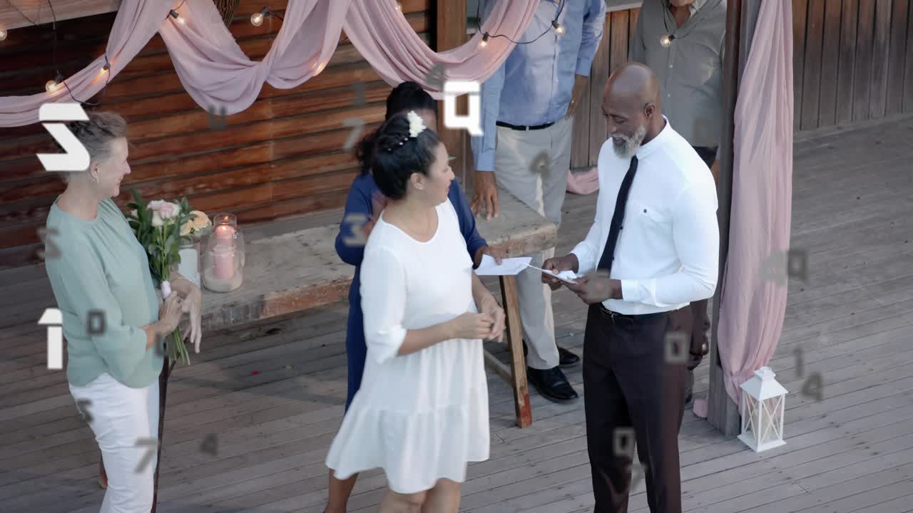 Bride walking to groom on deck, groom giving ring to wed, bride passing bouquet, guests clapping
