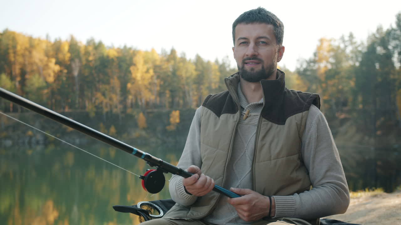 Man Fishing in Autumn Forest