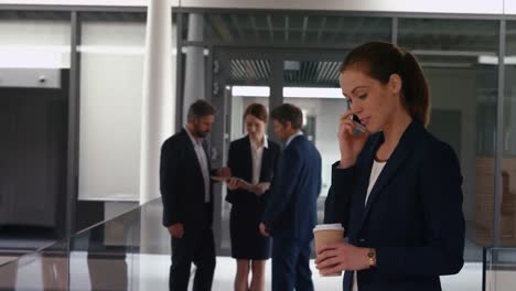 Businesswoman-talking-on-mobile-phone