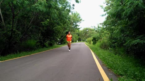 Woman-jogging-in-the-middle-of-the-street