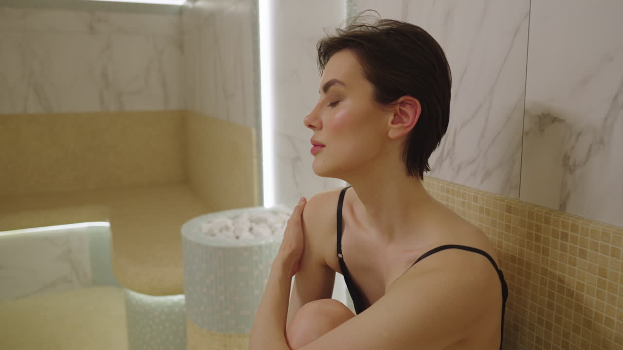 Woman Relaxing in a Modern Spa