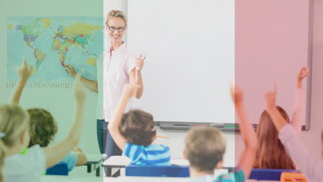 animation of flag of italy over smiling female teacher and schoolchildren in classroom