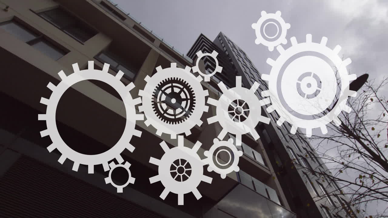 Rotating gears animation overlay on modern building exterior