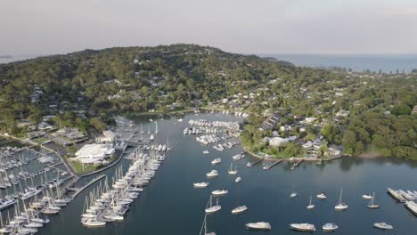 Boats-And-Yachts-Moored-On-Crystal-Bay-At-The-Yacht-Club-In-Pittwater,-NSW,-Australia