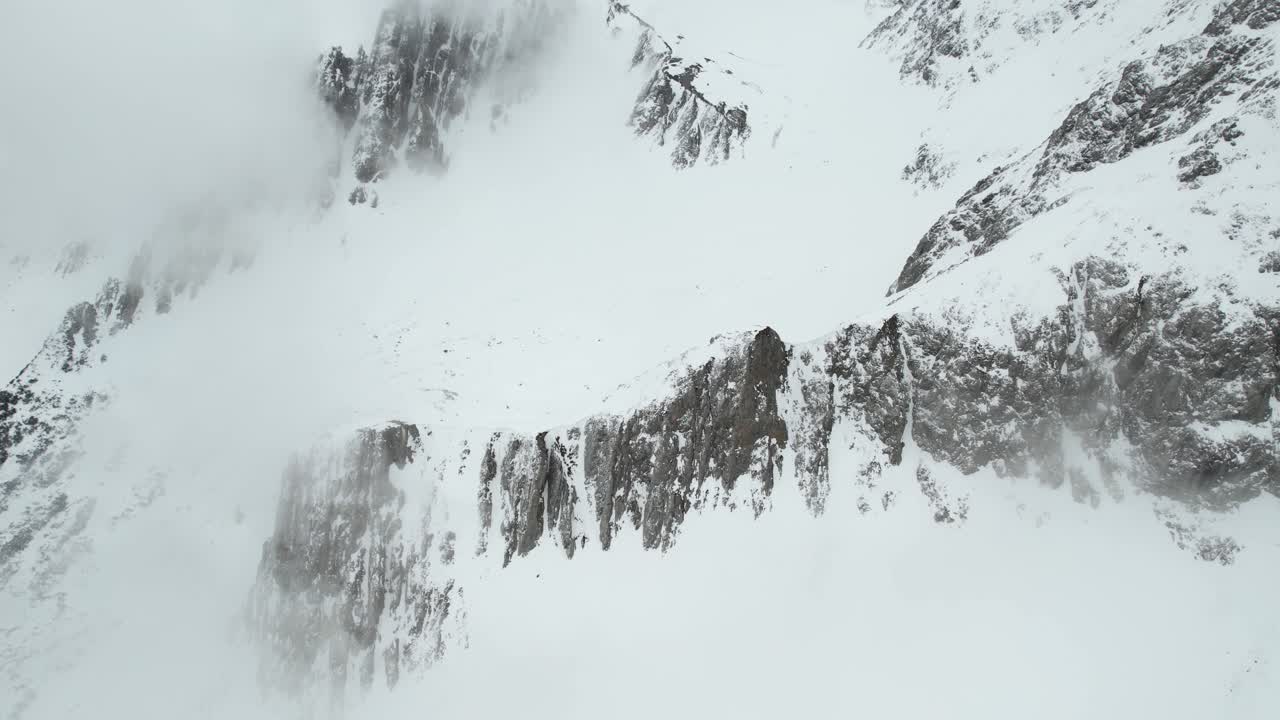 Aerial View of Snow Capped Hills and Peaks of Austrian Alps in Winter Season