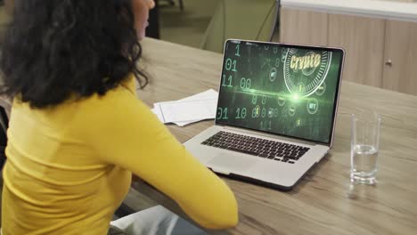 African-american-businesswoman-using-laptop-for-video-call-with-data-processing