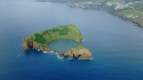 aerial drone shot of small tropical island located in sao miguel, azores