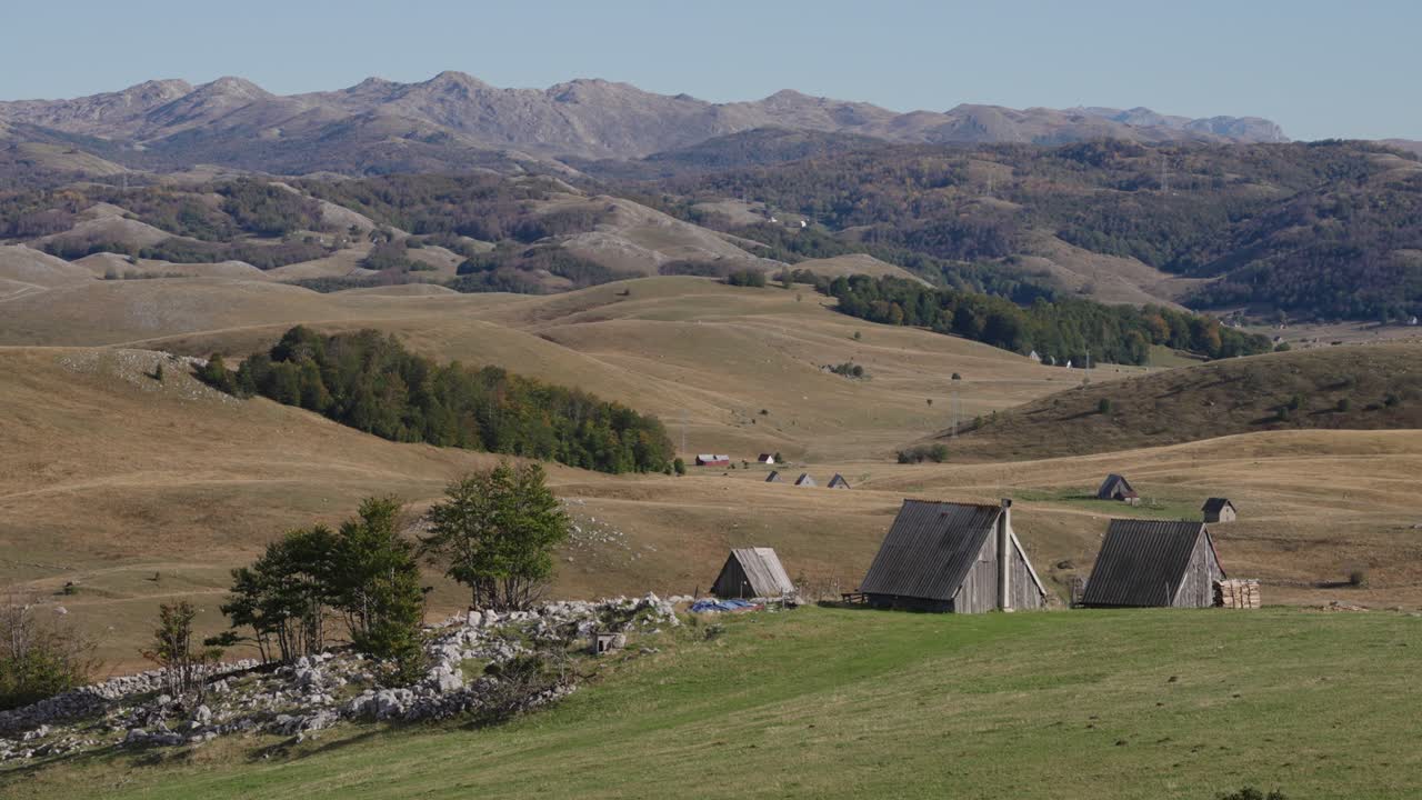 Scenic view of Durmitor National Park, Montenegro, with rustic cabins