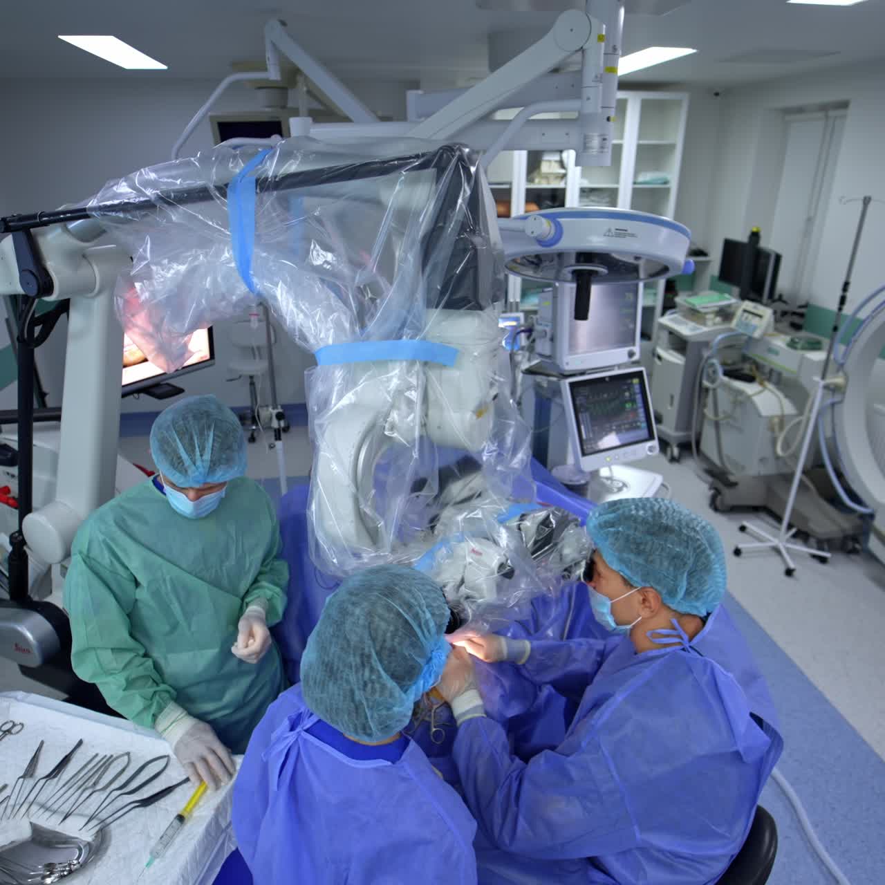 Emergency doctor with assistants working in new hospital. Surgery specialists working in modern operation ward