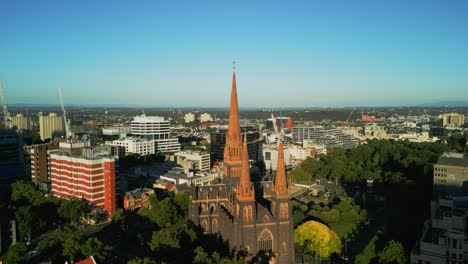 aerial drone orbit video of a church in melbourne, victoria, australia