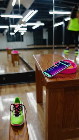 fitness app and workout gear at gym
