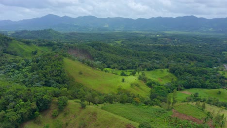 Aerial-flight-showing-beautiful-greened-landscape-of-Los-Mogotes,Villa-Altagracia,Dominican-Republic