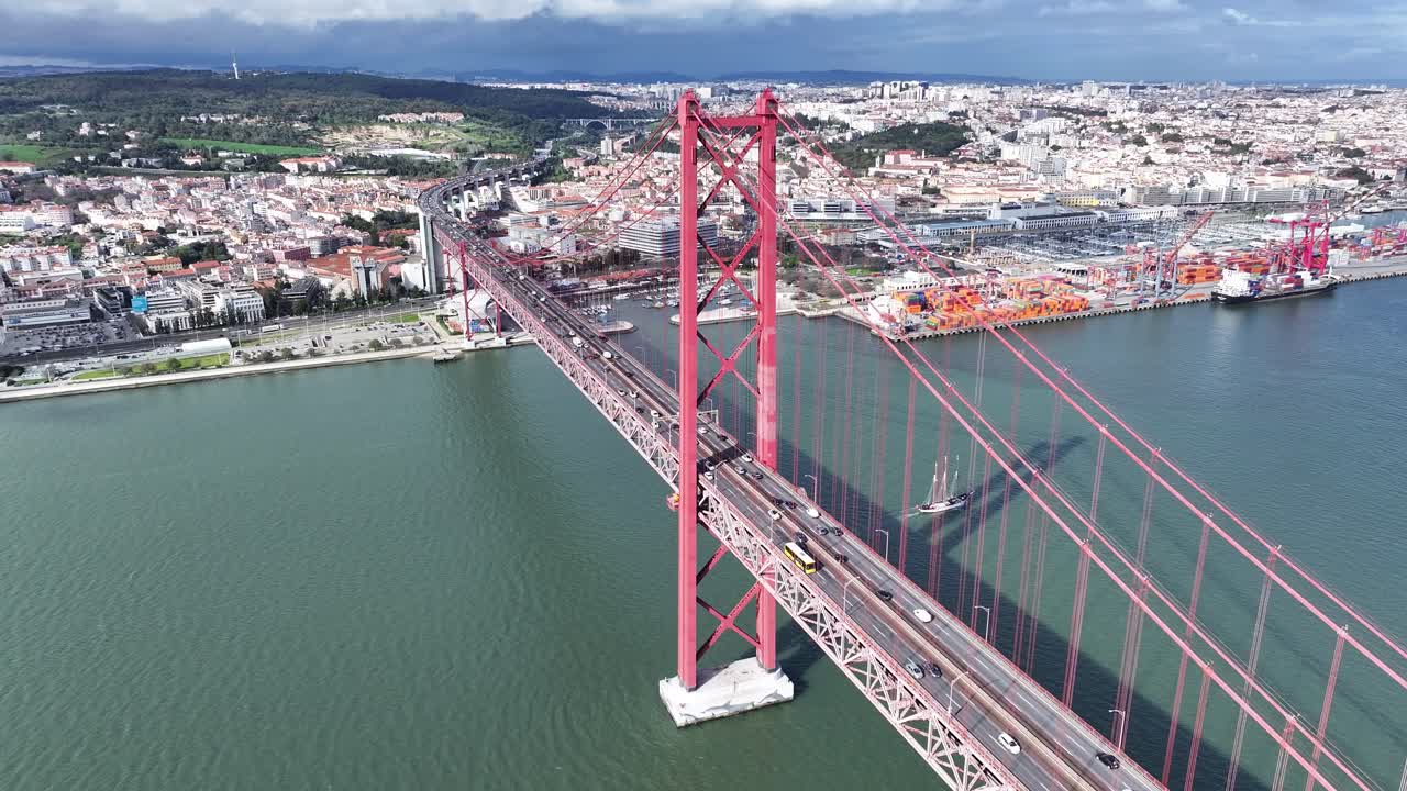 25 Of April Bridge At Lisbon In Lisbon District Portugal. Downtown City Skyline. Transportation Scenery. 25 Of April Bridge At Lisbon In Lisbon District Portugal. Famous Cable Stayed Bridge