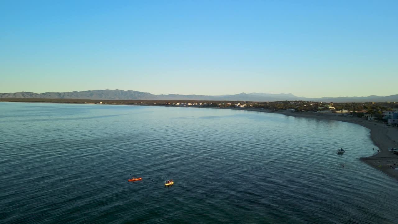 kayak pair exploring la paz bay in mexico