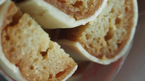 close-up view of stacked, glazed cookies