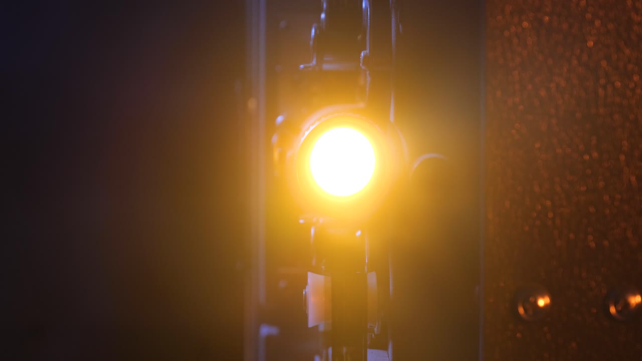 16mm movie projector crane shots in a smokey room