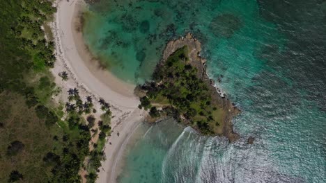 Two-idyllic-Caribbean-beaches-with-headland-between-them