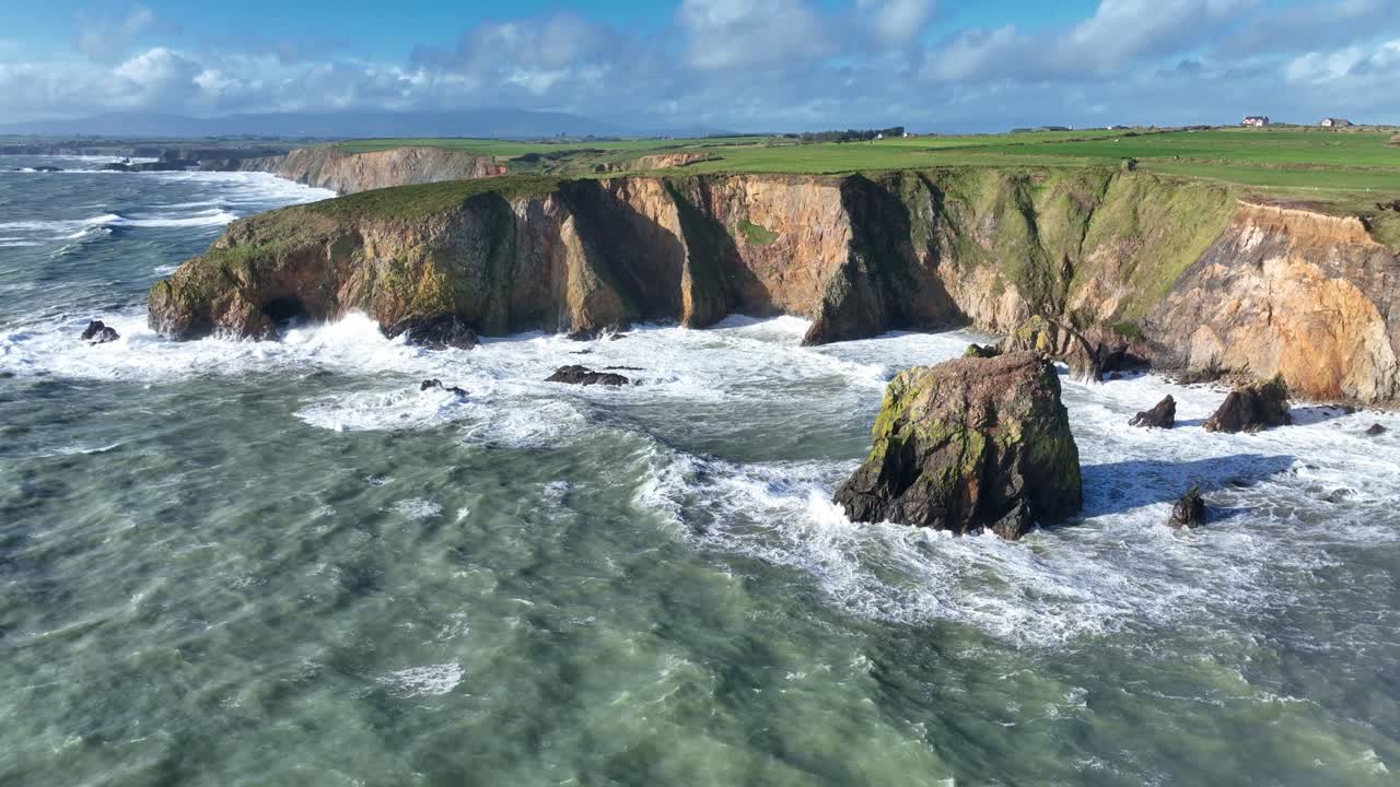 Epic Ireland drone view of winter storm on the Waterford Coast dramatic seas and waves Atlantic storm and forces of nature