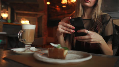 woman hands taking food photo by mobile phone. food photography. delicious breakfast.