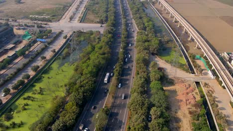 aerial drone shot capturing noida expressway in noida india with cars moving fast on the highway