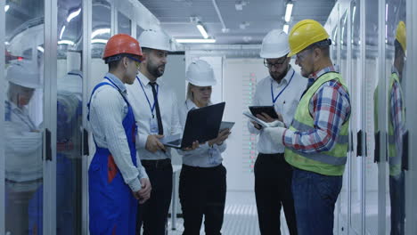 engineering team meeting in data center