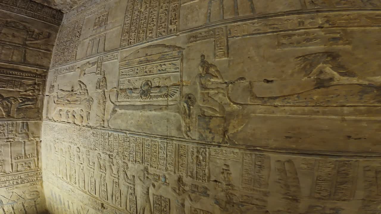 Detailed ancient wall carvings at Dendera Temple of Hathor in Egypt