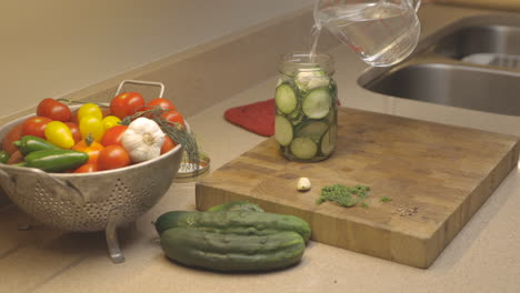 making refrigerator dill pickles in the kitchen